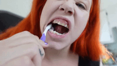 29188 - Brushing teeth and tongue in Natural light